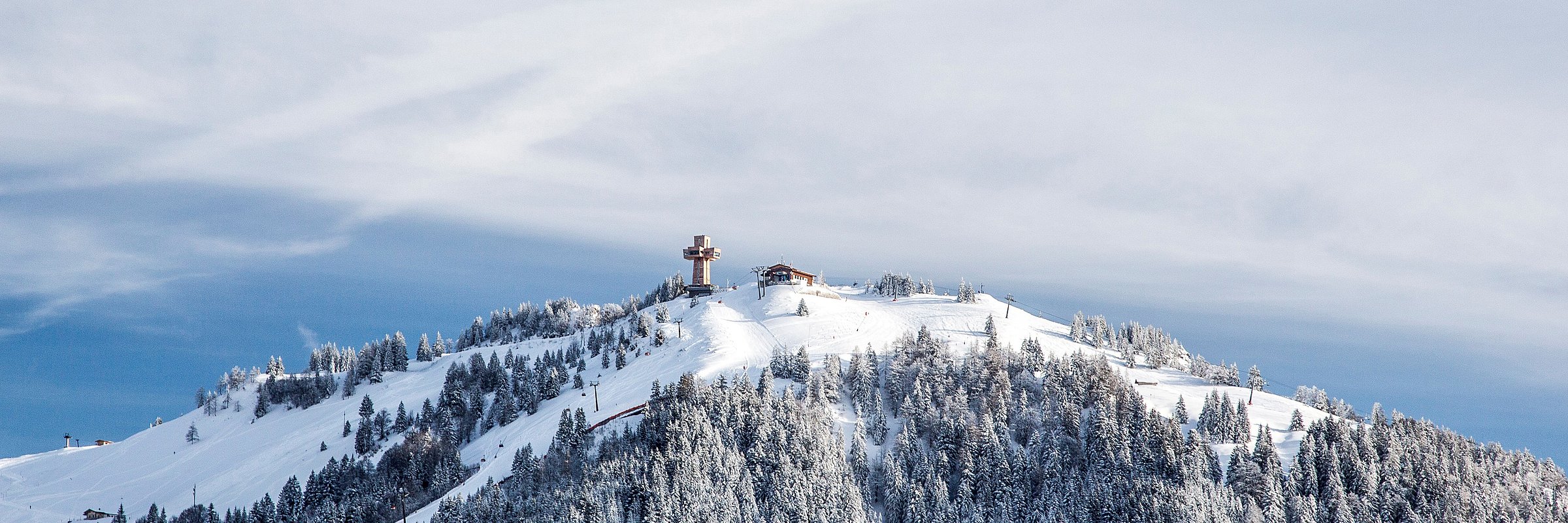 Jakobskreuz on the Buchensteinwand in Tyrol in winter